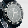Load image into Gallery viewer, Traser 0131758 quartz day date Bezel and dial are black Belt has scratches and dirt 44.2mm