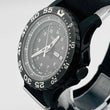 Load image into Gallery viewer, Traser 0131758 quartz day date Bezel and dial are black Belt has scratches and dirt 44.2mm