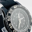 Load image into Gallery viewer, Traser 0131758 quartz day date Bezel and dial are black Belt has scratches and dirt 44.2mm