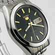 Load image into Gallery viewer, SEIKO 7S26-Q0X0 Seiko 5 Automatic Day Date Back Skeleton Round Black Dial 34.6mm