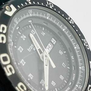 Traser 0131758 quartz day date Bezel and dial are black Belt has scratches and dirt 44.2mm