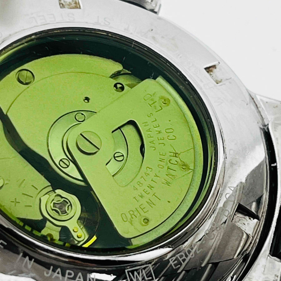 Orient ER02-CB-B-CA Skeleton back automatic winding rainbow bezel side scratched 41.0