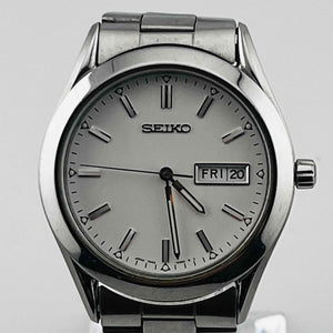 SEIKO 7N43-9080 Quartz white dial small scratches on bezel and straps 35.9mm