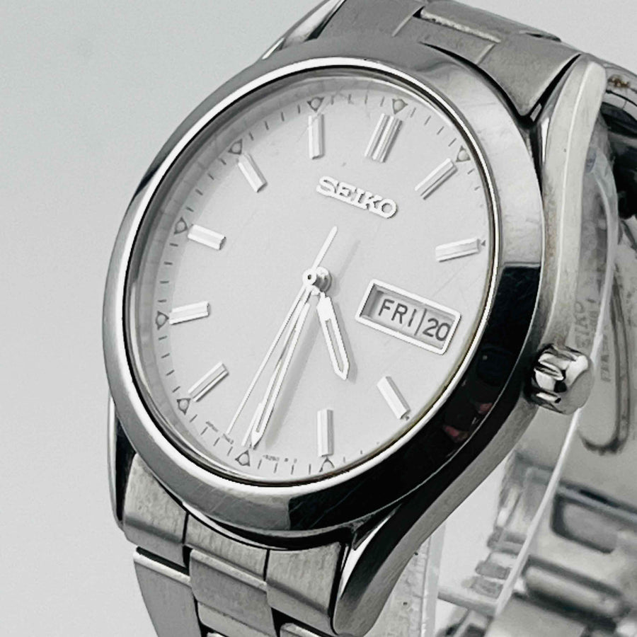 SEIKO 7N43-9080 Quartz white dial small scratches on bezel and straps 35.9mm