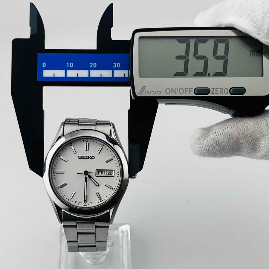 SEIKO 7N43-9080 Quartz white dial small scratches on bezel and straps 35.9mm