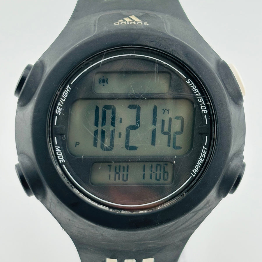 Adidas ADP6085 quartz day date display sports Windshield has scratches KUM S WATCH