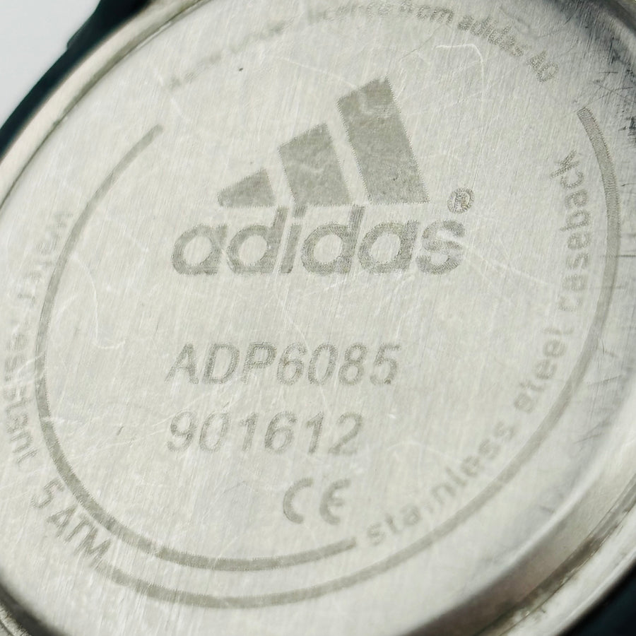 Adidas  ADP6085 quartz day date display sports Windshield has scratches 42.0mm