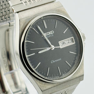 SEIKO Chronos 8123-7090 Quartz Date and day of the week Black Dial 33.4mm