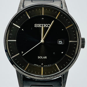 SEIKO V147-0AK0 solar analog men's date Water resistant wristwatch 38.2mm